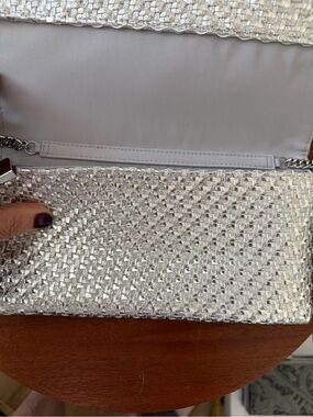 Sondra Roberts Silver Woven Metallic Clutch with Chain. Worn for one event.